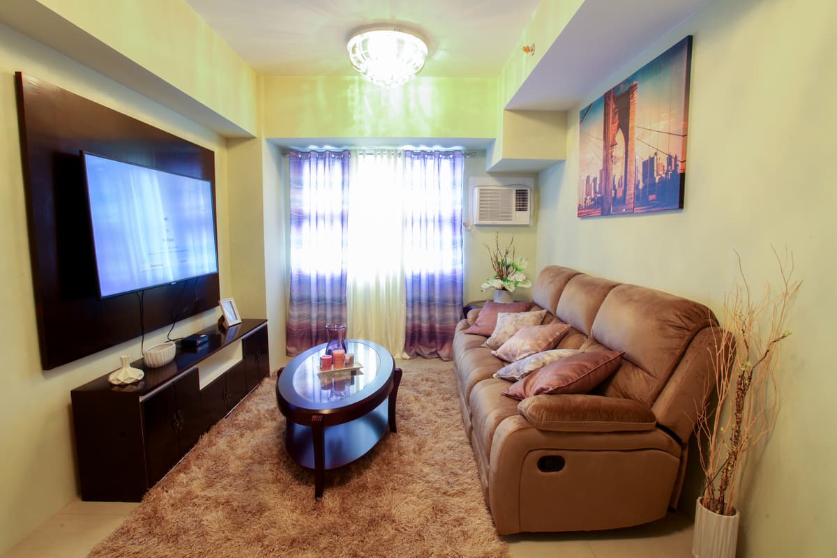 Comfortable lounge with large smart TV and premium sound system